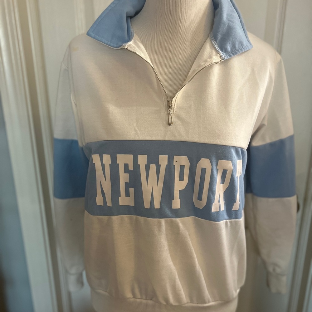 White with blue long sleeve shirt